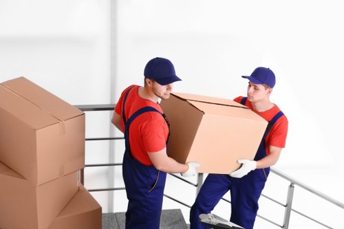 Professional movers handling a North Sheen home removal