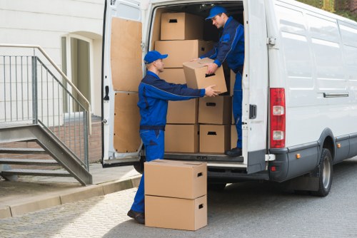 North Sheen removals team unloading boxes at a new property