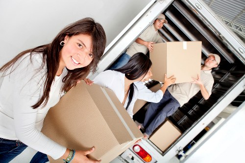 Local packing team preparing items for move day in North Sheen